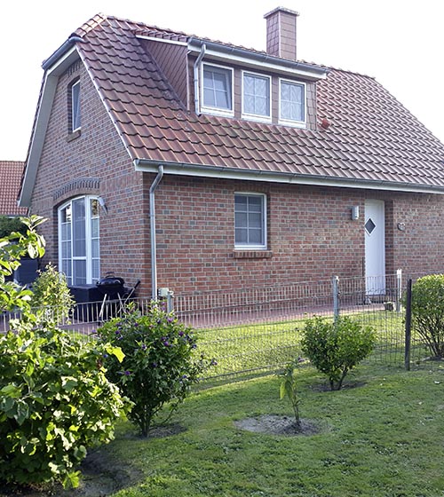 Ferienhaus mit Gartenzaun